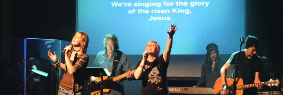 Praise team worshipping in Sr. High room.